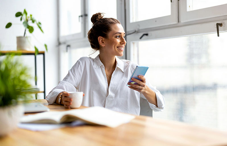 Young woman doing research on her phone