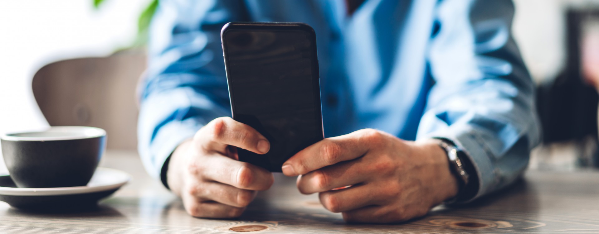 Young woman doing research on her phone